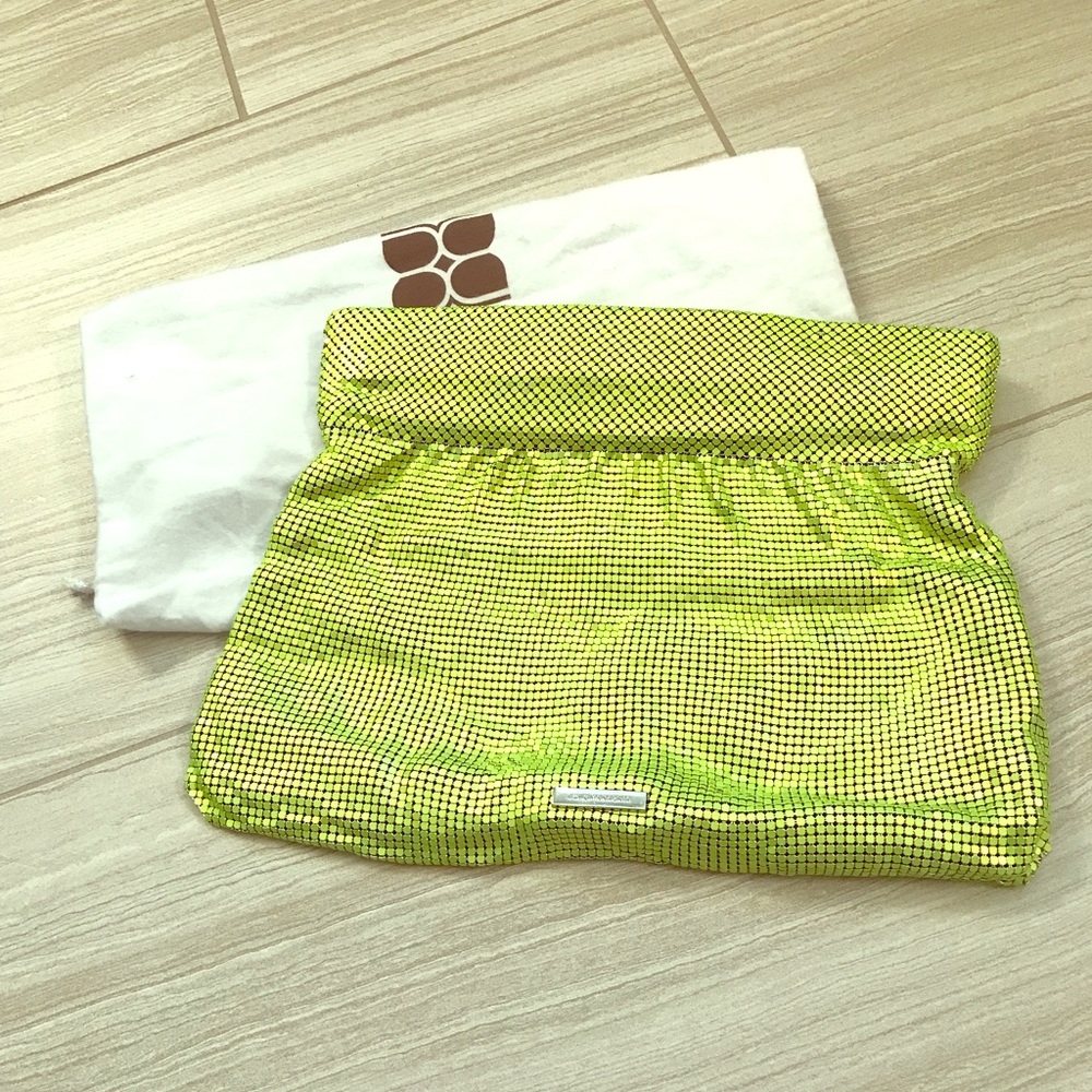 BCBG green metal clutch